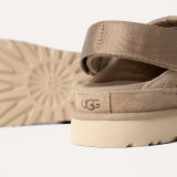 Ugg Women's Goldenstar Clogs in Sand sole view