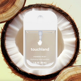Touchland Beach Coco Power Mist Hand Sanitizer in coconut scent bottle