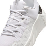 Nike Women's Free Metcon 7 Workout Shoes in White and Metallic Silver angle view