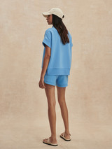 Varley Women's Ritchie Short Sleeve Sweatshirt in Azure Blue back view