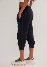 FP Movement Women's Flutter Cropped Joggers in Black back view