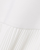 Lacoste Women's Ultra Dry Stretch Tennis Dress in White skirt detail