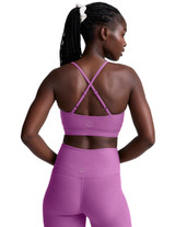 Beyond Yoga Women's Twist Strappy Sports Bra in Fun Fuschia Heather back view