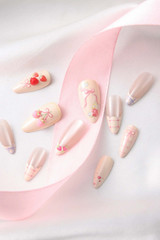 Never Have I Ever Floral Femme Almond Press-On Nails application