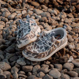 The HeyDude x Burlebo Kids' Wally Funk Deer Camo Shoes