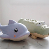 Sunny Life Kids' Water Squirter Toy in Lilac Dolphin colorway front view
