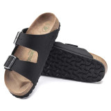 The Birkenstock Women's Arizona Vegan Sandals in Black Biribuck