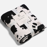 Cow Print Throw Blanket in Black and White front view