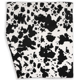 Cow Print Throw Blanket in Black and White texture close-up