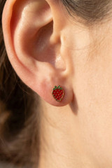 Fame Strawberry Stud Earrings worn on ear