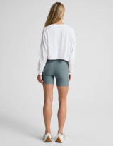 Beyond Yoga Women's Spacedye Keep Pace Shorts in storm heather, back view.