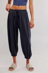 FP Movement Women's Momentum Pants in black, front view