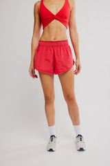 FP Movement Women's Now Or Never Shorts in grapefruit combo, front view