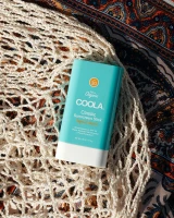 COOLA Classic SPF 30 Sunscreen Stick in Tropical Coconut side view