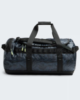 The North Face Base Camp 71L Duffel Bag in TNF Black Glowing Topo Print side view