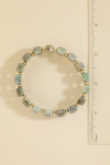 Fame Marbled Oval Cabochon Stretch Bracelet in Green and Gold detail view