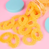 Candy Club Pineapple Ring Gummies spilled pile