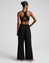 Beyond Yoga Women's glowzone™ Hybrid Straight Leg Pants in Black detail view