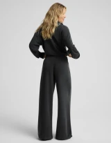 Beyond Yoga Women's Luxe Sandwash Double Knit Wide Leg Pants in Dark Charcoal back view