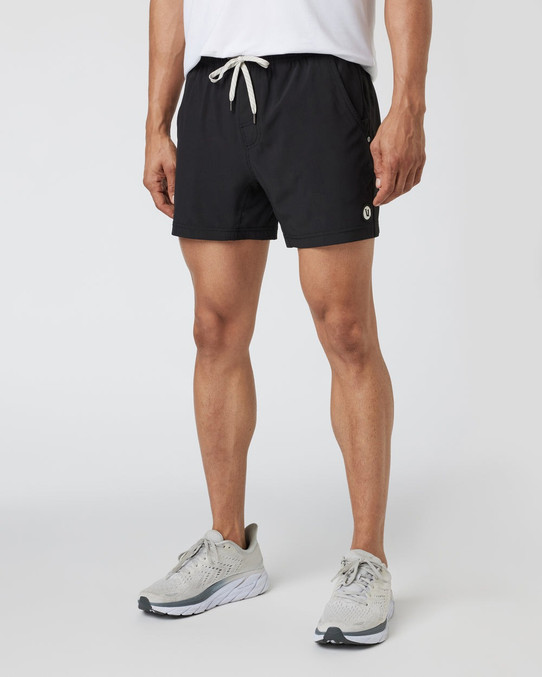 Vuori Men's Kore 5" Shorts in black, front view