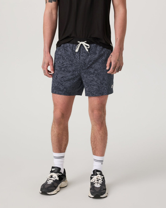 Vuori Men's Kore 5" Shorts in charcoal, front angle view