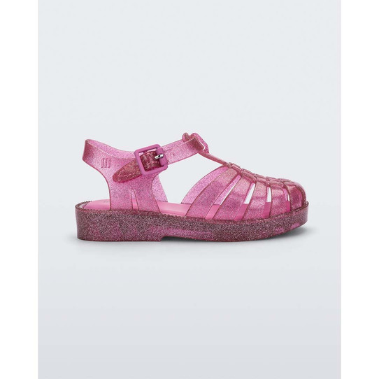 The Mini Melissa Possession Shiny BB Sandal in the colorway Glitter Pink