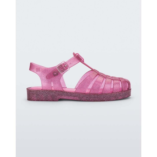 The Mini Melissa Little Kids Possession Shiny Sandal in the colorway Glitter Pink