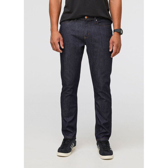 The DUER Men's Performance Denim Relaxed Taper Jeans in the Heritage Wash