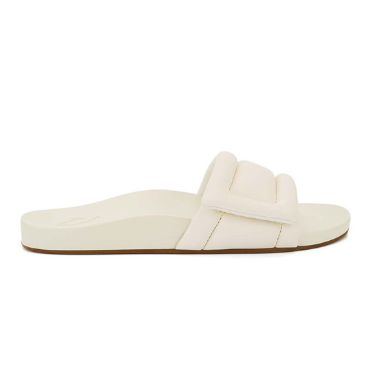 The Olukai Women's Sunbeam Slides in Off White