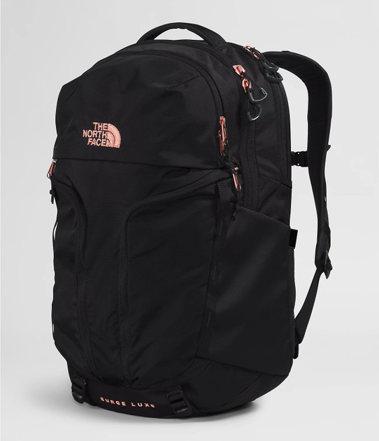 The North Face Women's Surge Luxe Backpack in TNF Black/Burnt Coral