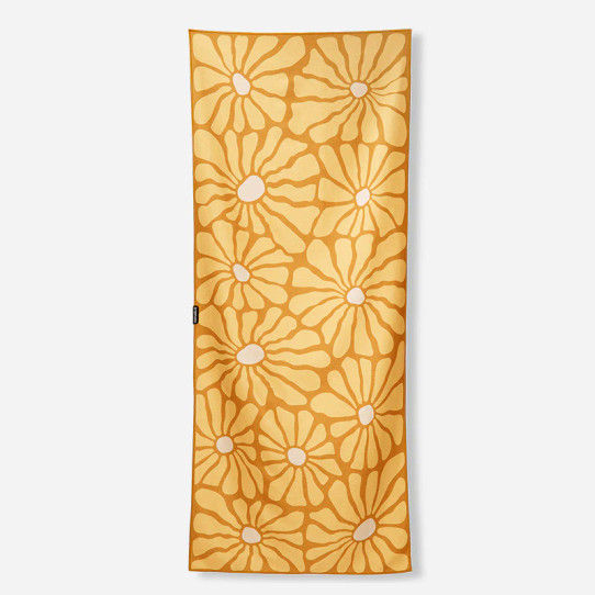 The Nomadix Lazy Daisy Towel in Lazy Daisy Gold