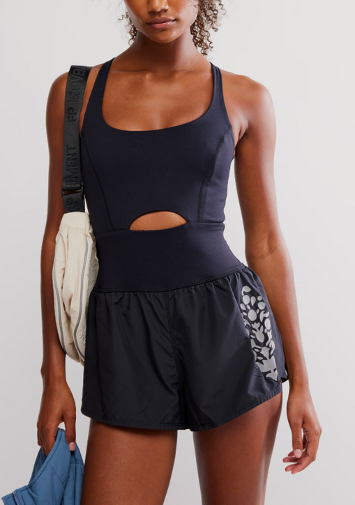 FP Movement Women's Righteous Reflective Logo Runsie in Black