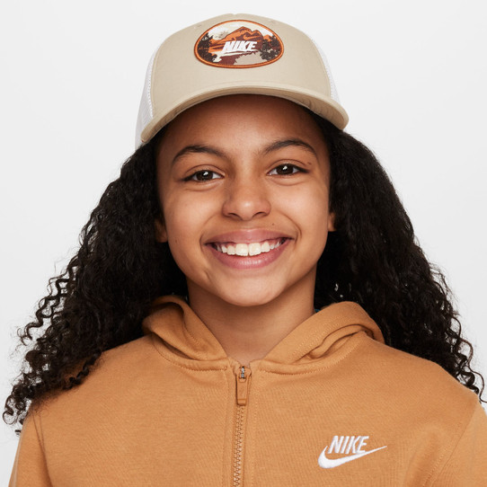 The Nike Kids' Rise Outdoor Trucker Cap in Desert Khaki The Nike Kids' Rise Outdoor Trucker Cap in Desert Khaki
