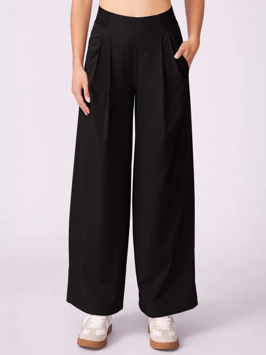 Thrive Societe Women's Commuter Trousers in Black back view