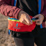 Cotopaxi Bataan 3L Del Día Fanny Pack in teal, angled view