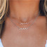 Pura Vida Delicate Wave Necklace in Rose Gold detail view