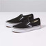 Vans Kids' Classic Slip-On shoes in navy blue canvas with white sole.