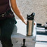 YETI Rambler Bottle with Straw Cap in lifestyle setting angle view