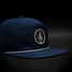 Melin Coronado Anchored Hydro Hat navy blue angled side view