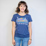 TYLER's Women's Austin Faraway Tee in cream, angled view