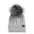 The North Face Women's Oh-Mega Fur Pom Beanie in dark colorway with fur pom
