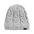 The North Face Women's Cable Minna Beanie in deep yellow knit, angled view