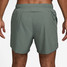 The Nike Men's Dri-FIT Challenger 5 inch Brief-Lined Shorts in Clay Green