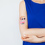 Tattly Temporary Tattoo Set featuring colorful rainbow kitten designs for application