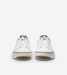 The Cole Haan Men's GrandPrø Topspin Sneakers in Optic White and Black