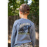 Model wearing the Burlebo Boys' Black Lab Dog Long Sleeve Tee in the Heather Blue Jean colorway