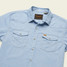 The Howler Brothers Men's H Bar B Snapshirt in the Faded Blue Oxford Colorway