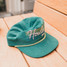 The Howler Brothers Men's Howler Beach Club Snapback in Teal Corduroy