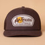 The Texas Hill Country Provisions Cedar Chopper Trucker Hat in the Over Yonder Charred Oak Colorway