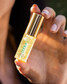 COOLA Liplux Hydrating Lip Oil product display